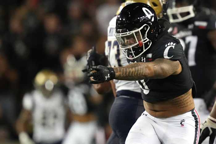 Nov 5, 2022; Cincinnati, Ohio, USA; Cincinnati Bearcats linebacker Ivan Pace Jr. (0) celebrates after a sack against Navy Midshipmen quarterback Xavier Arline (not pictured) in the fourth quarter at Nippert Stadium in Cincinnati. Cincinnati won 20-10. Mandatory Credit: Kareem Elgazzar/Cincinnati Enquirer via USA TODAY NETWORK
